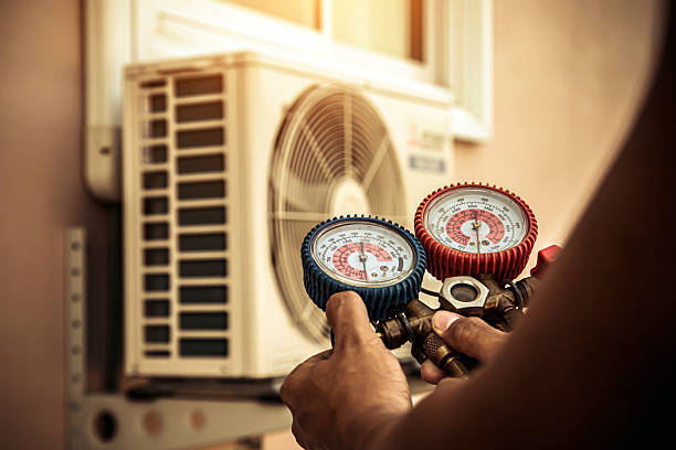 Professional Heat Pump Repair technician working in Groveland, MA